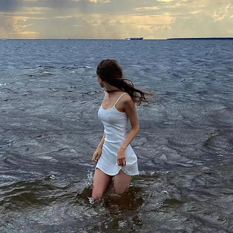 Women's Summer Mini Slim Dress Solid Color Ribbed Sleeveless Camisole Dress Revealing Backpack Buttocks Beach Vacation Dress
