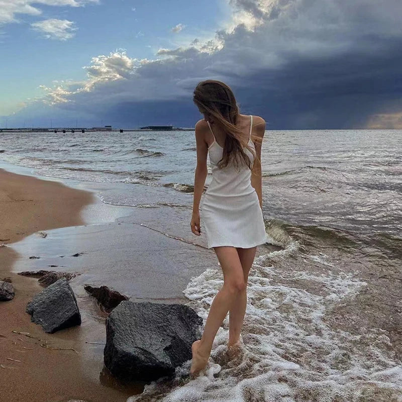 Women's Summer Mini Slim Dress Solid Color Ribbed Sleeveless Camisole Dress Revealing Backpack Buttocks Beach Vacation Dress
